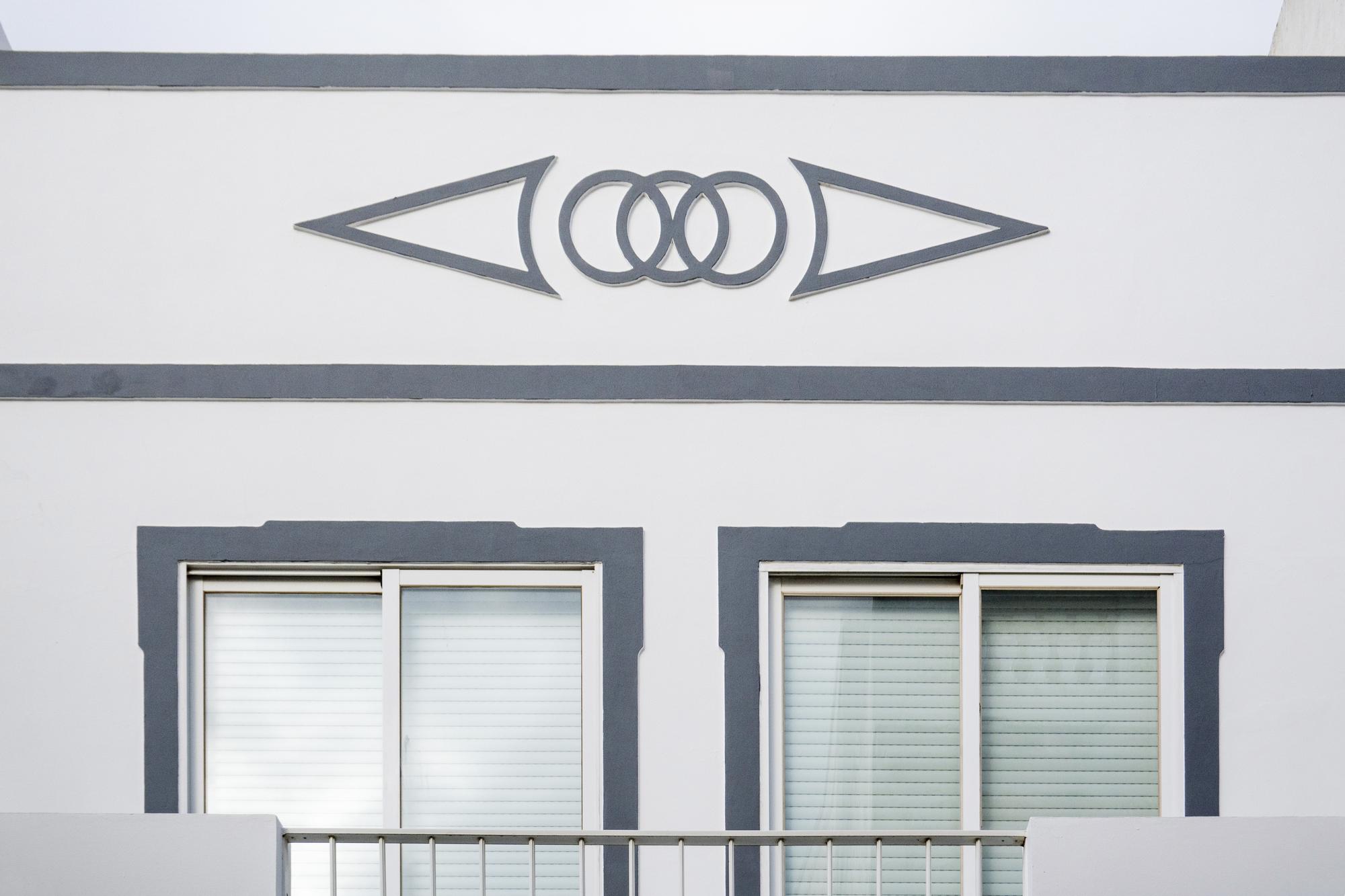 studio exterior with sign and window light